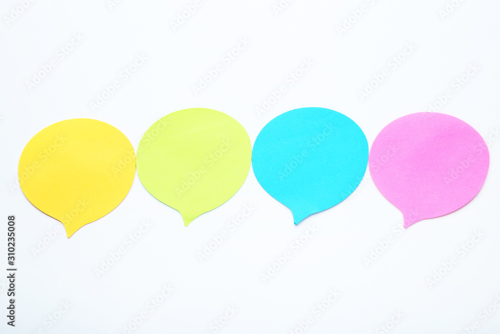 Paper speech bubbles on white background Paper speech bubbles on white background