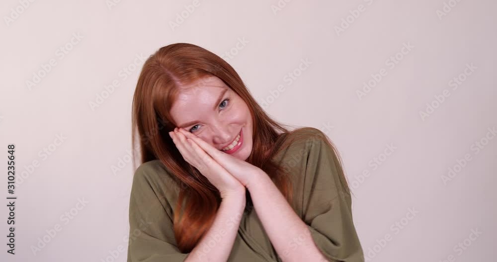 Happy beautiful young woman on light grey background Happy beautiful young woman on light grey background