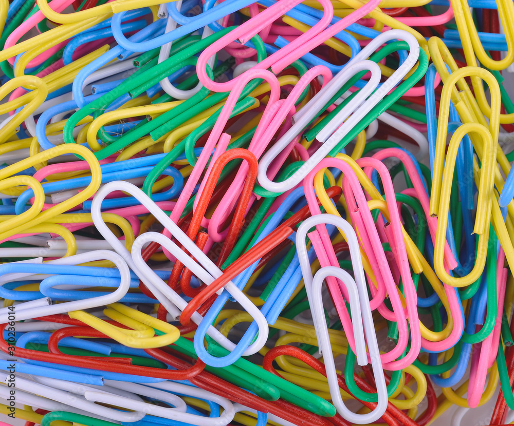 Closeup colorful paper clips set Closeup colorful paper clips set