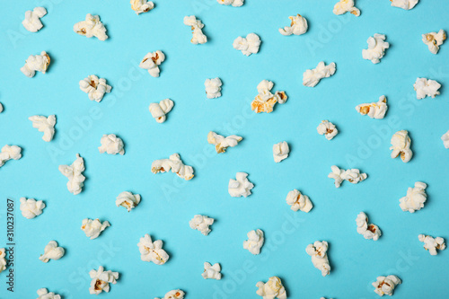 popcorn on a colored background top view with place for text © White bear studio 