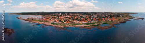Aerial of Torekov town in southern Sweden during a warm summer afternon. 