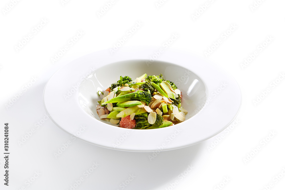 Salad with Avocado, Broccoli, Cucumber and Almonds Isolated Salad with Avocado, Broccoli, Cucumber and Almonds Isolated