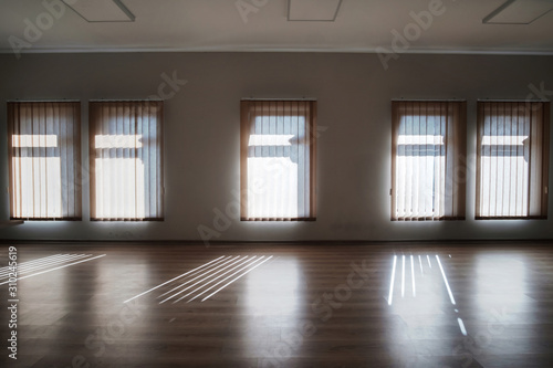 Empty room interior with closed windows