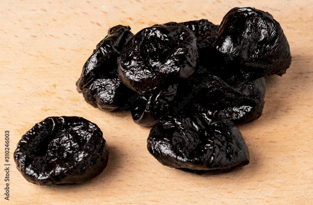 The fruits of sun-dried black plum (prunes) The fruits of sun-dried black plum (prunes)