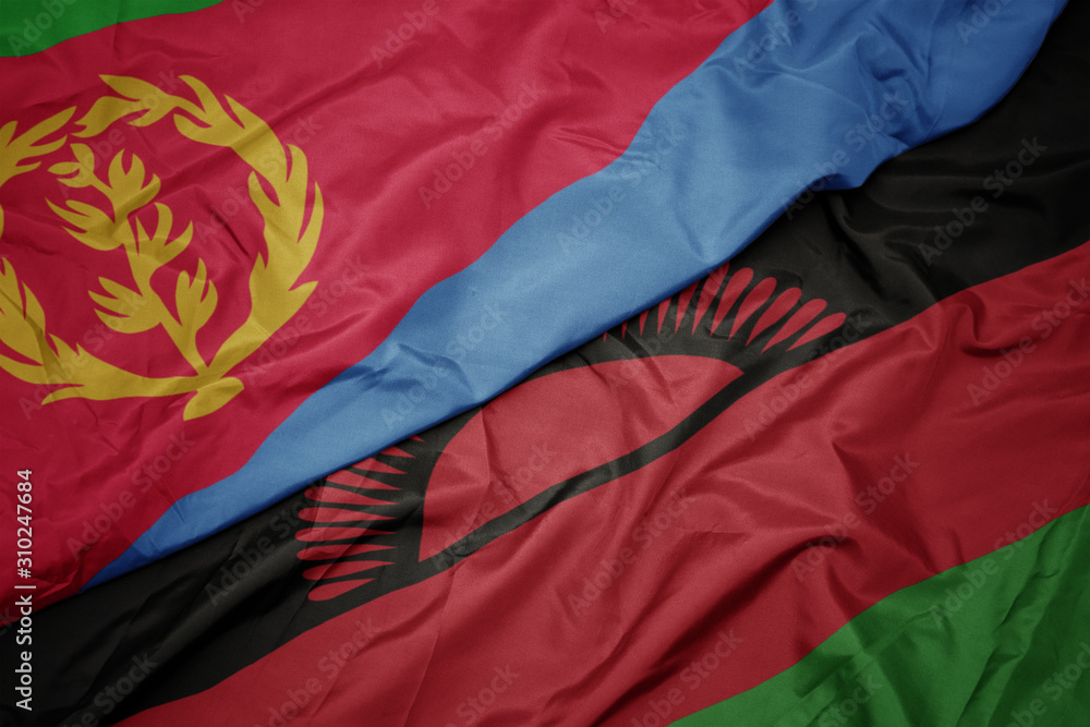 waving colorful flag of malawi and national flag of eritrea.