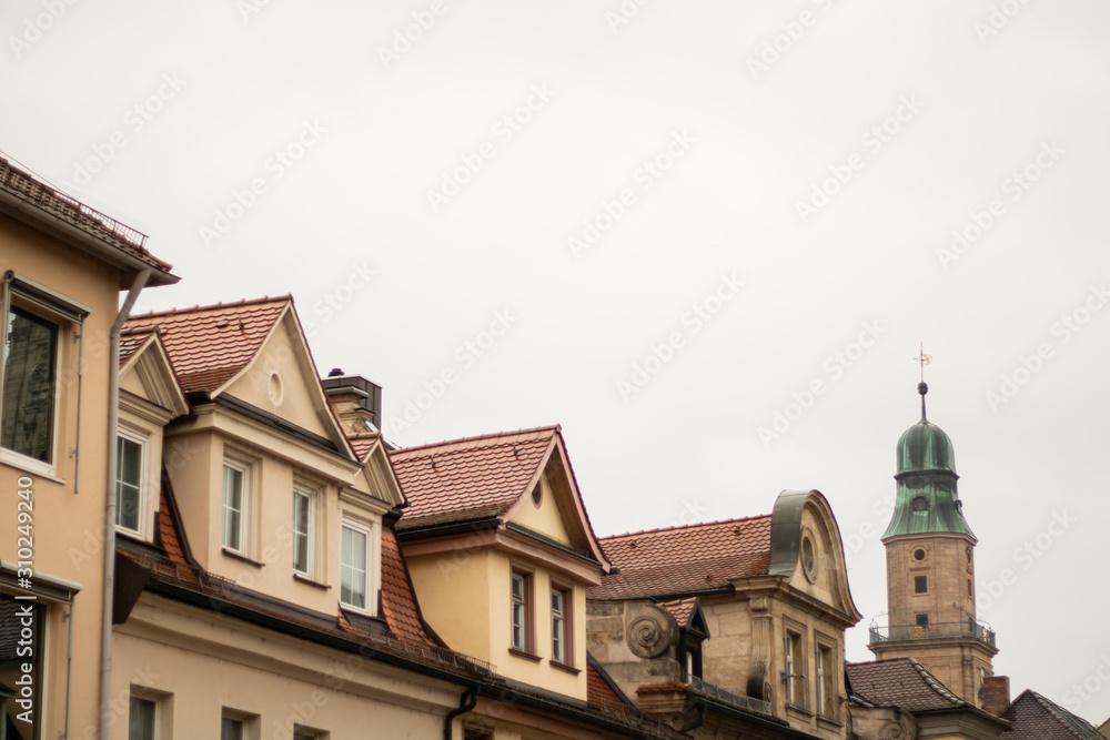 Roofs of the city on a background of gray sky
