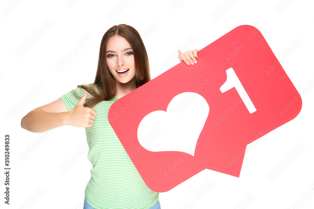 Young woman holding paper card with heart and number one on white background Young woman holding paper card with heart and number one on white background
