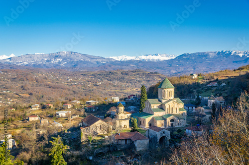 View of the monastery Gelati and mountains with snow, Imereti, Georgia photo