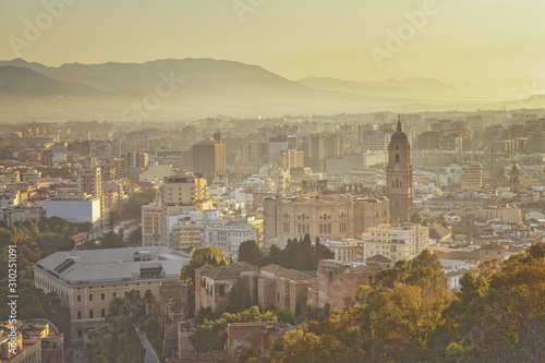 Cityscape of Malaga in sunset, Spain