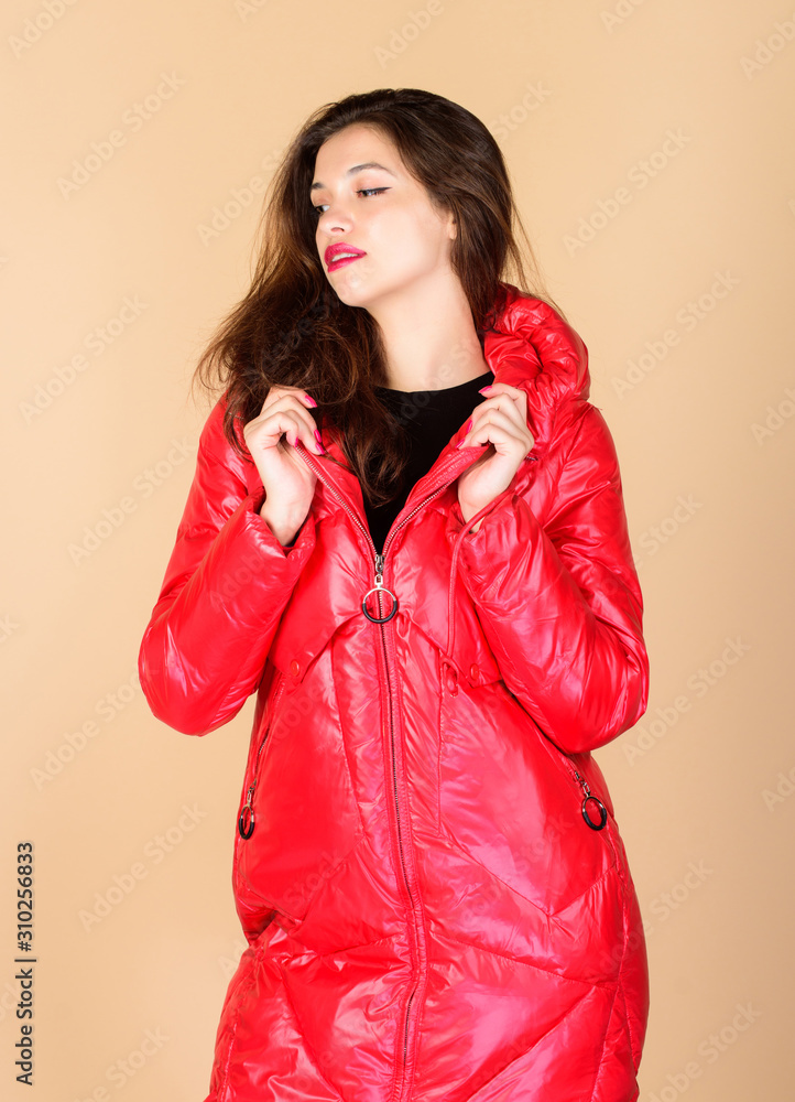 Warm coat. Fashion model. Comfortable down jacket. Red color. Finding right winter jacket is essential to enjoyable and bearable winter season. Shop for quality. Girl enjoy wearing bright jacket Warm coat. Fashion model. Comfortable down jacket. Red color. Finding right winter jacket is essential to enjoyable and bearable winter season. Shop for quality. Girl enjoy wearing bright jacket