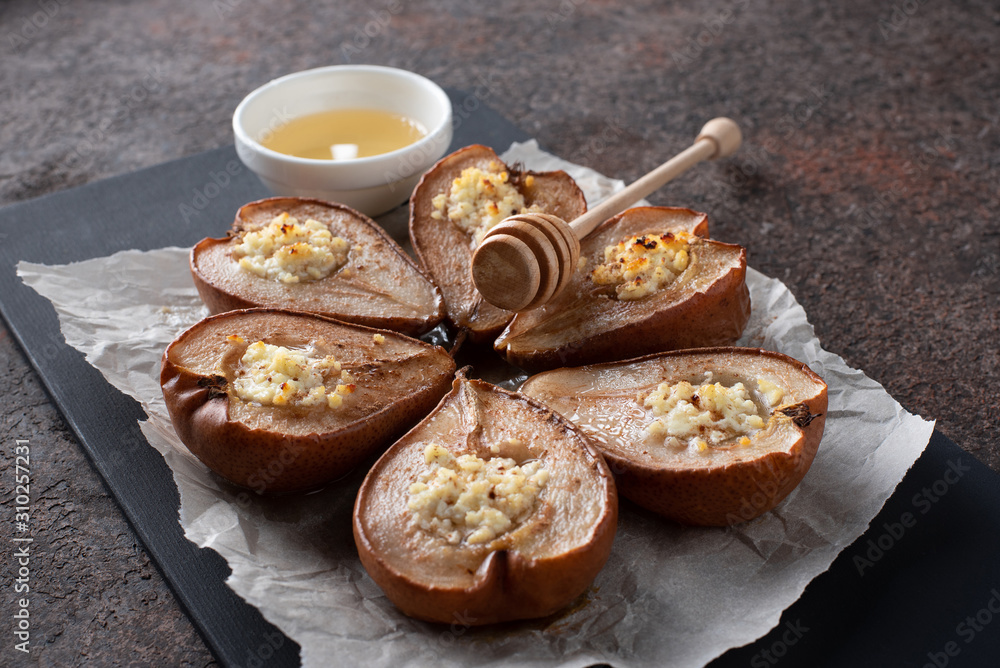 Baked pears with cheese, cinnamon, honey.