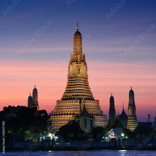 Wat Arun Temple at sunset in bangkok Thailand. Wat Arun is a Buddhist temple in Bangkok Yai district of Bangkok  Thailand