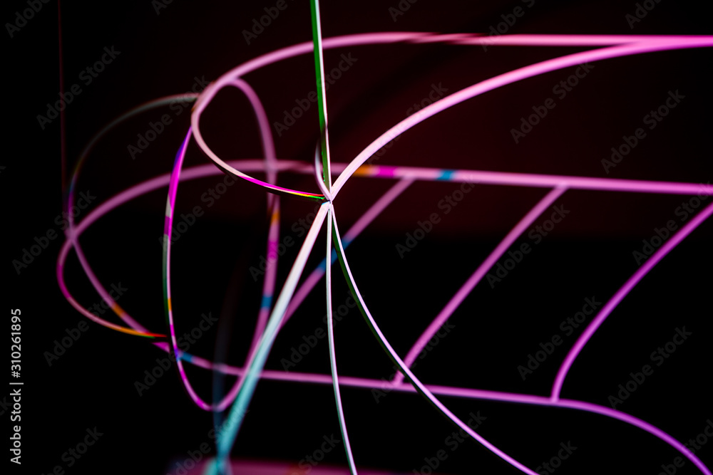 Neon green and red thin wire. Luminous wires, decoration and illumination of the surface. Electroluminescent wire, lighting objects and light base. Neon green and red thin wire. Luminous wires, decoration and illumination of the surface. Electroluminescent wire, lighting objects and light base.