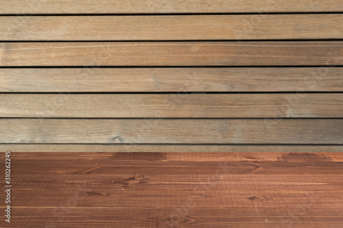 Wooden table in front of a blurred background. Perspective brown wood with a blurry background of nature or park - can be used to showcase or assemble your products. Mock up to display the product.
