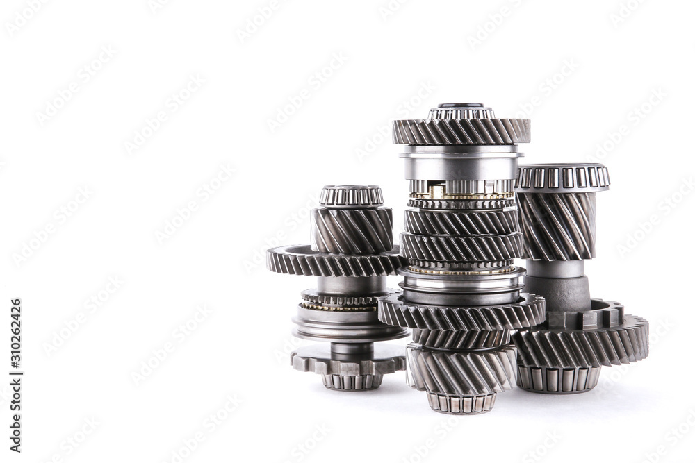 set of Metal shafts with gears on white background with copy space set of Metal shafts with gears on white background with copy space