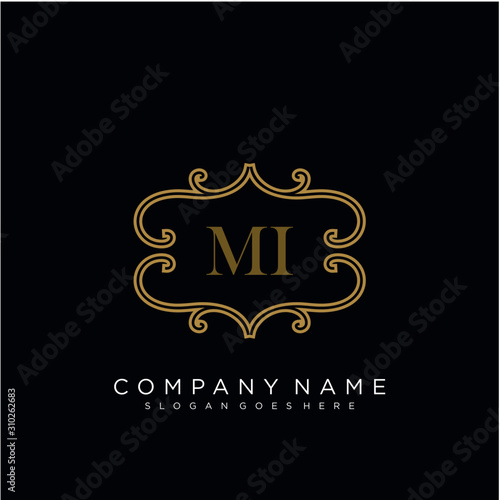 Initial letter MI logo luxury vector mark, gold color elegant classical