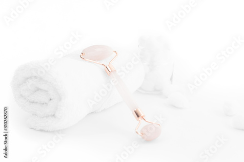 Jade roller. Jade face roller for beauty facial massage therapy