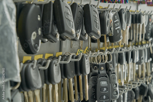 duplicates of keys of car in the wall of a locksmith's shop to be able to make the copies