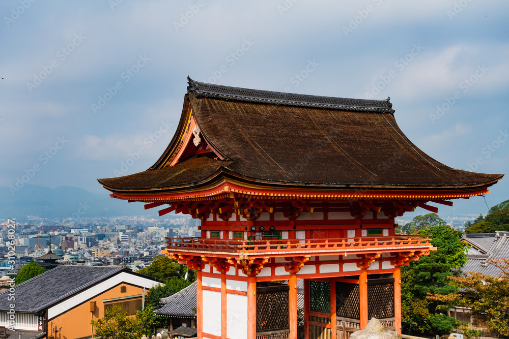 Main Gate of Kiyomizu-dera Temple with brown roof and red wooden base in Kyoto, Japan Main Gate of Kiyomizu-dera Temple with brown roof and red wooden base in Kyoto, Japan