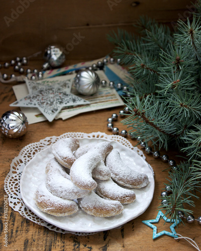 Obraz na płótnie Vanilkipferl - vanilla crescents, traditional Christmas cookies in Germany, Austria, Czech Republic. Homemade cookies. w salonie