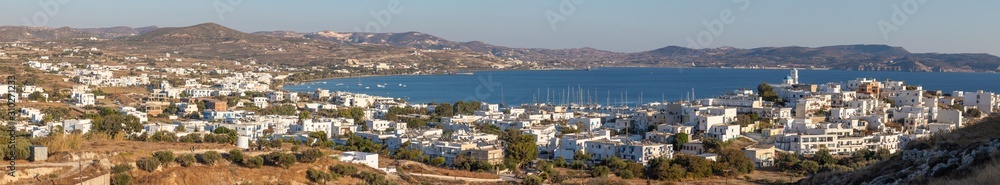 Panorama of  Adamas village with houses, bay and church