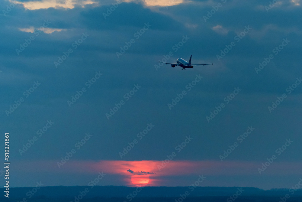 View of airplane going up against beautiful sky