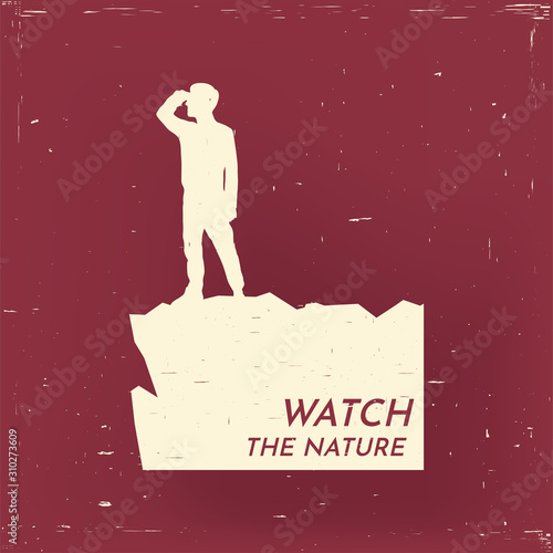 Vintage emblem with paper scratches effect. Aged photo design. Logotype with grain. Retro print. Man on the cliff looking at nature. Travel and nature exploring concept. Vector color illustration