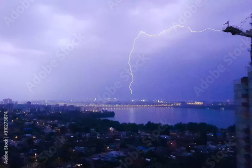 Lightning during thunderstorm in the sky. Natural phenomenon of