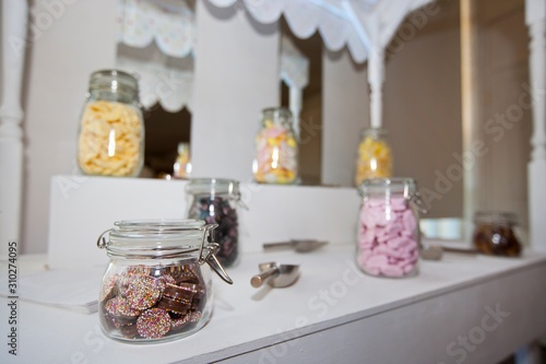 Close-up view of confectionary in glass jars