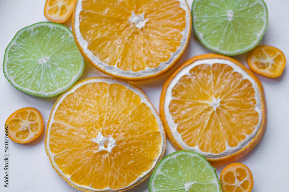 Fototapeta premium Classic shot of citrus fruits in the kitchen on white background