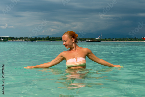 Woman at tropical island beach