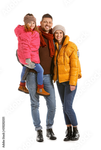 Happy family in winter clot...