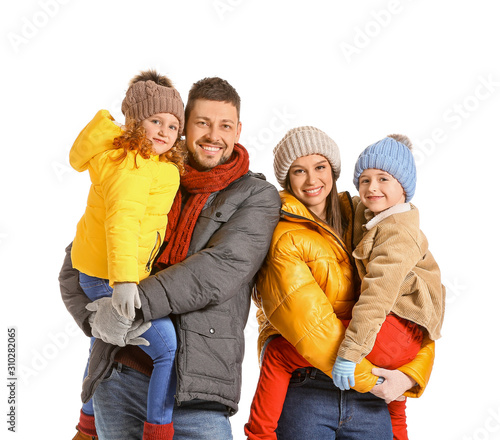 Happy family in winter clot...