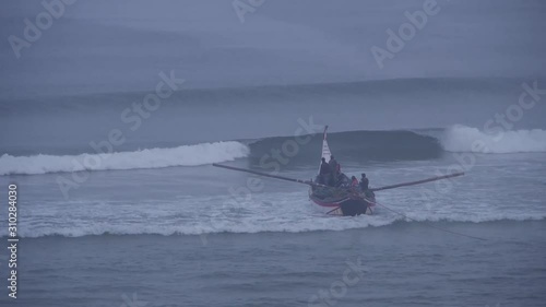 Barra de Mira - Portugal: a day at the beach. Traditional fishing. photo