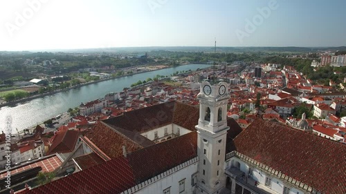 video of white concrete tower clock during daytime