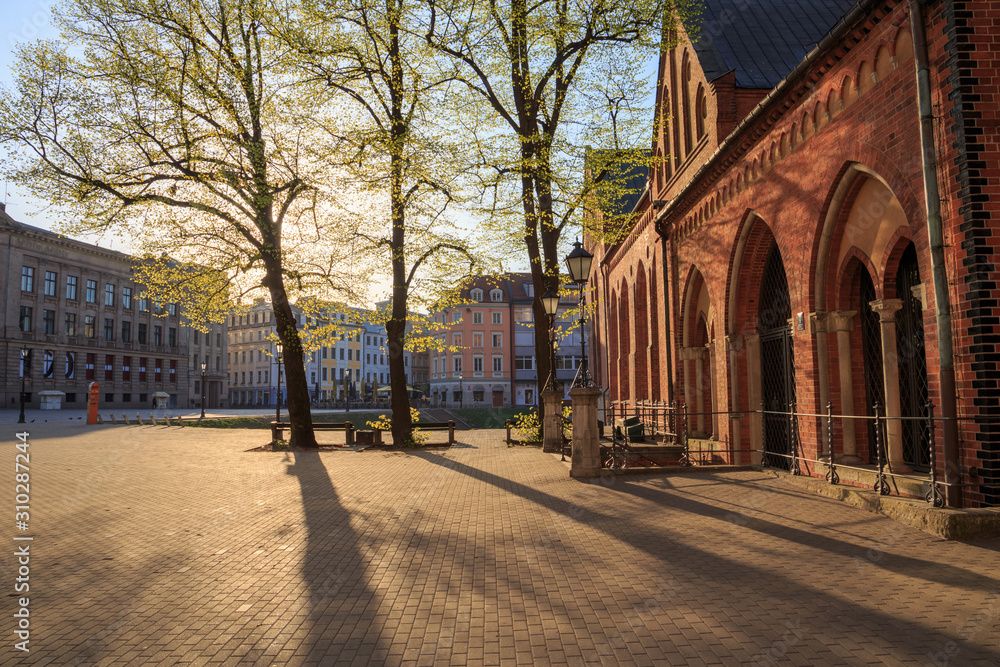 Cathedral Square (Doma Laukums) in Riga, Latvia, empty on a sunny morning. Cathedral Square (Doma Laukums) in Riga, Latvia, empty on a sunny morning.