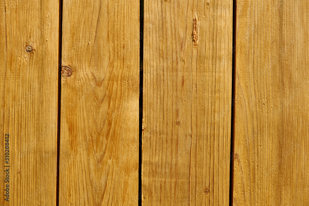 Yellow wooden plank for background or texture Yellow wooden plank for background or texture