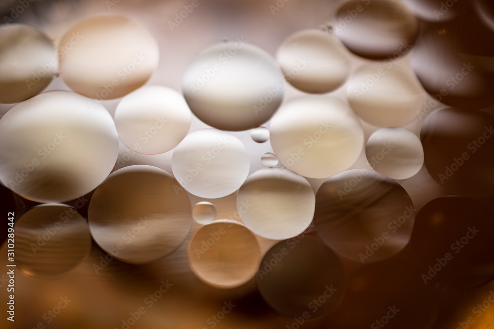 oil in water gold and browns abstract oil in water gold and browns abstract