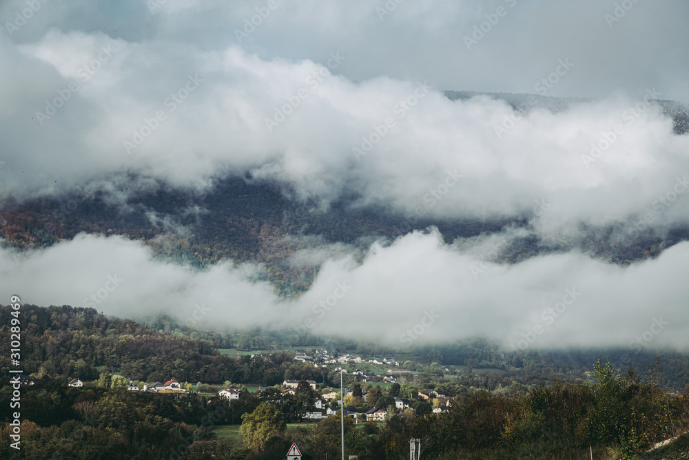 SAVOY, FRANCE / NOVEMBER 2019: Beautiful clouds formations over the valley SAVOY, FRANCE / NOVEMBER 2019: Beautiful clouds formations over the valley