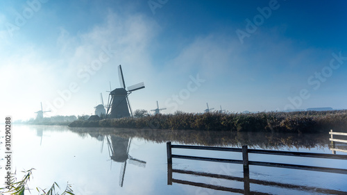 dutch windmill in kinderdijk holland in the morning