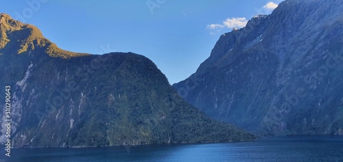 Milford Sound Fjord, Milford Sound / New Zealand - December 18, 2019: The Dramatic Mountains and Waterfalls of the Milford Sound Fjord, New Zealand photo