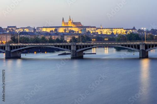 View on Prague castle over bridges at blue hour