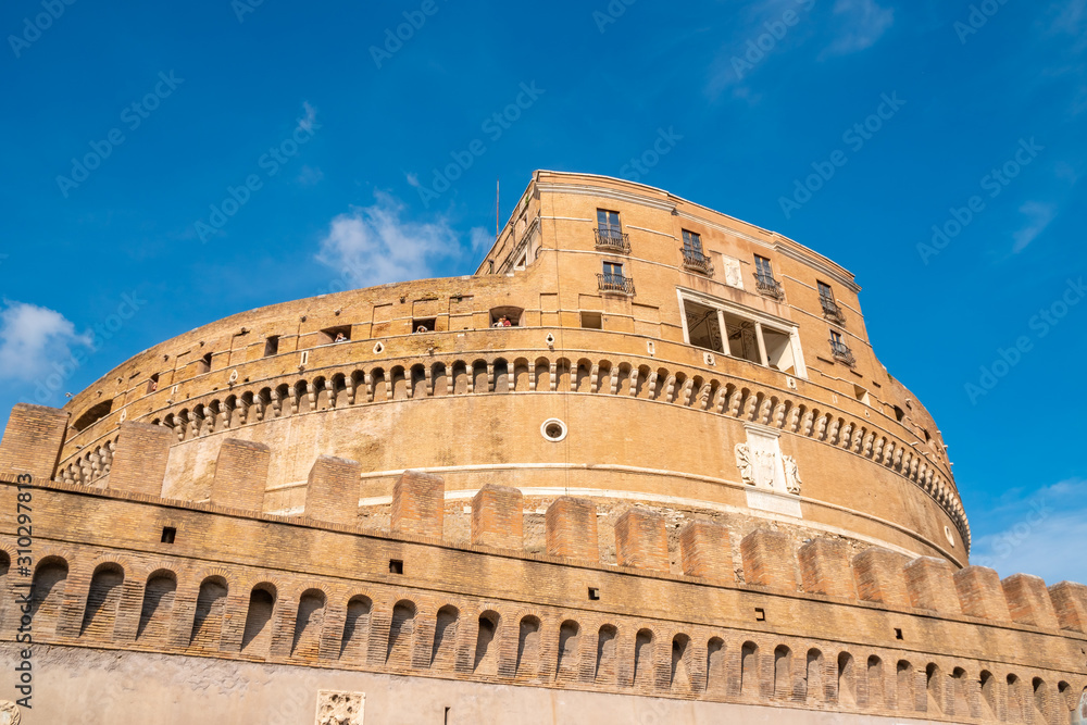 Castel Sant'Angelo in Rome, on the banks of the Tiber River near the arched bridge