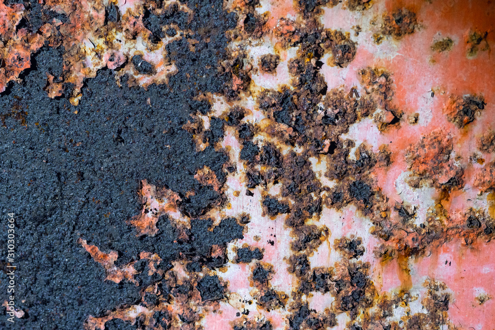 Rusty metal wall with cracked paint, background texture Rusty metal wall with cracked paint, background texture