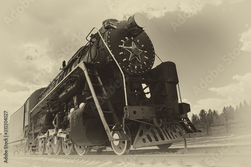 vintage steam train on the rails close-up, retro vehicle, steam engine, black and white photo