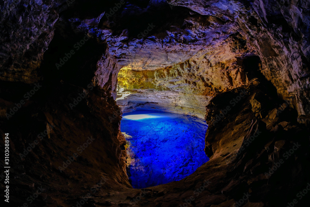 Poco Encantado, blue lagoon with sunrays inside a cavern in the Chapada Diamantina, Andarai, Bahia, Brazil Poco Encantado, blue lagoon with sunrays inside a cavern in the Chapada Diamantina, Andarai, Bahia, Brazil