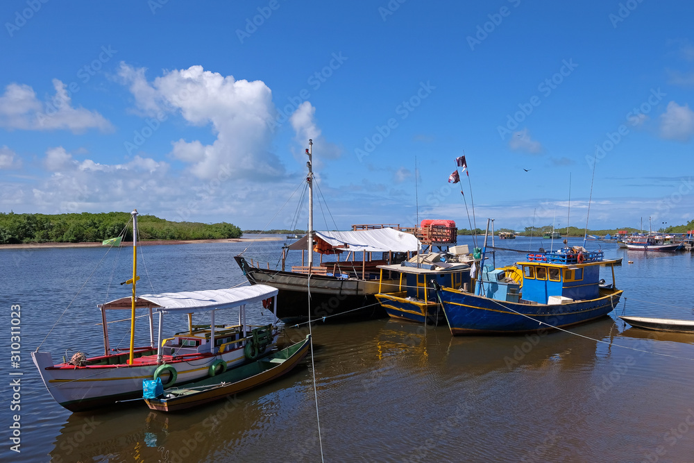 Colorful boats and ships at the little harbor of Santa Cruz Cabralia, Bahia, Brazil