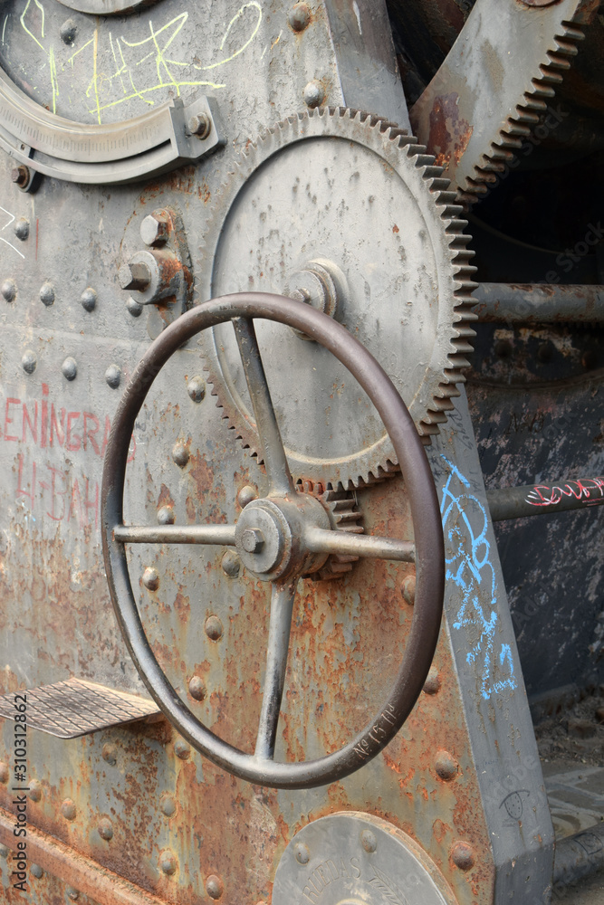 Detail of Metal Wheels & Gears on Old Weathered Artillery Cannon Detail of Metal Wheels & Gears on Old Weathered Artillery Cannon
