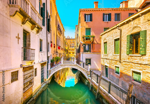 Venice cityscape, buildings, water canal and bridge. Italy