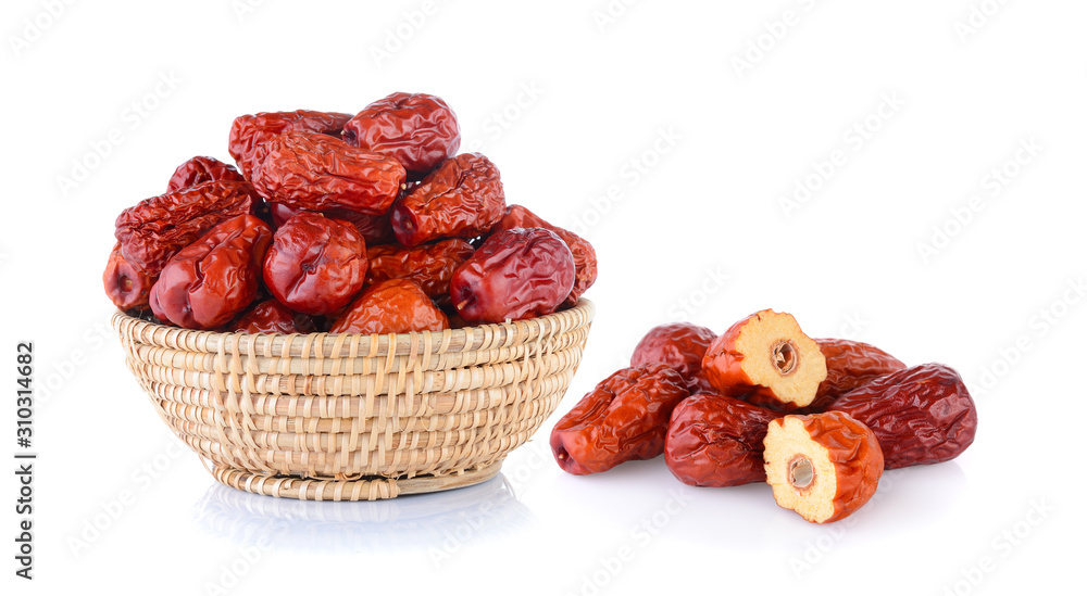 Dried red date or Chinese jujube in basket on white Dried red date or Chinese jujube in basket on white